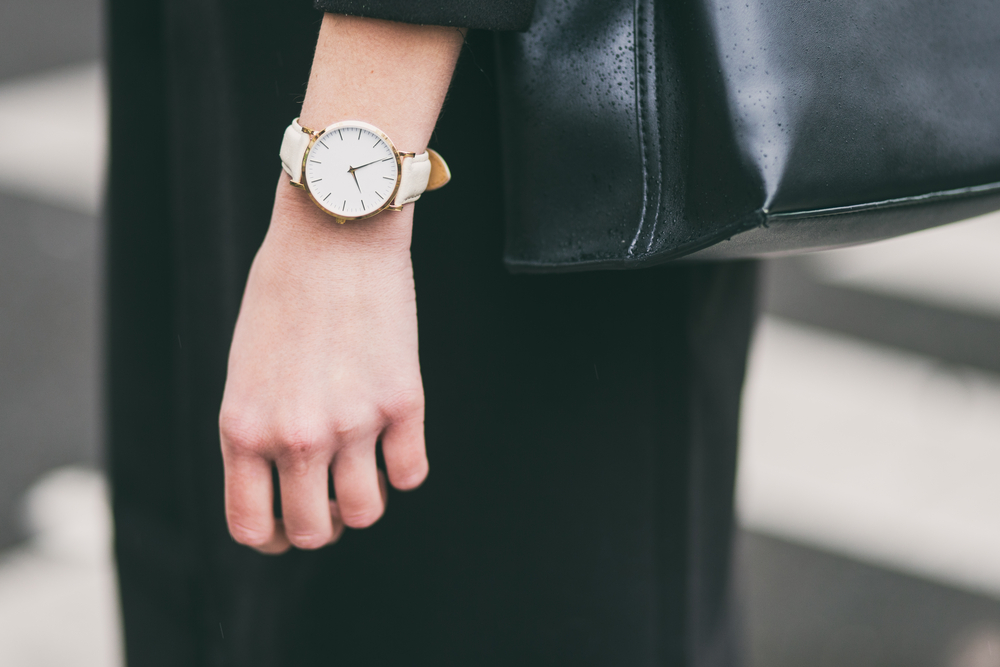 luxury watch and leather jacket